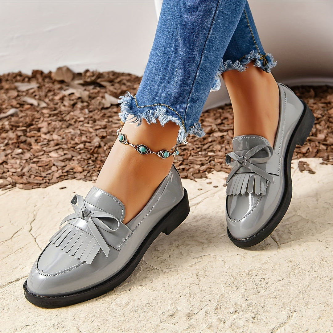 Damen Slipper mit Fransen und Schleifendetail
