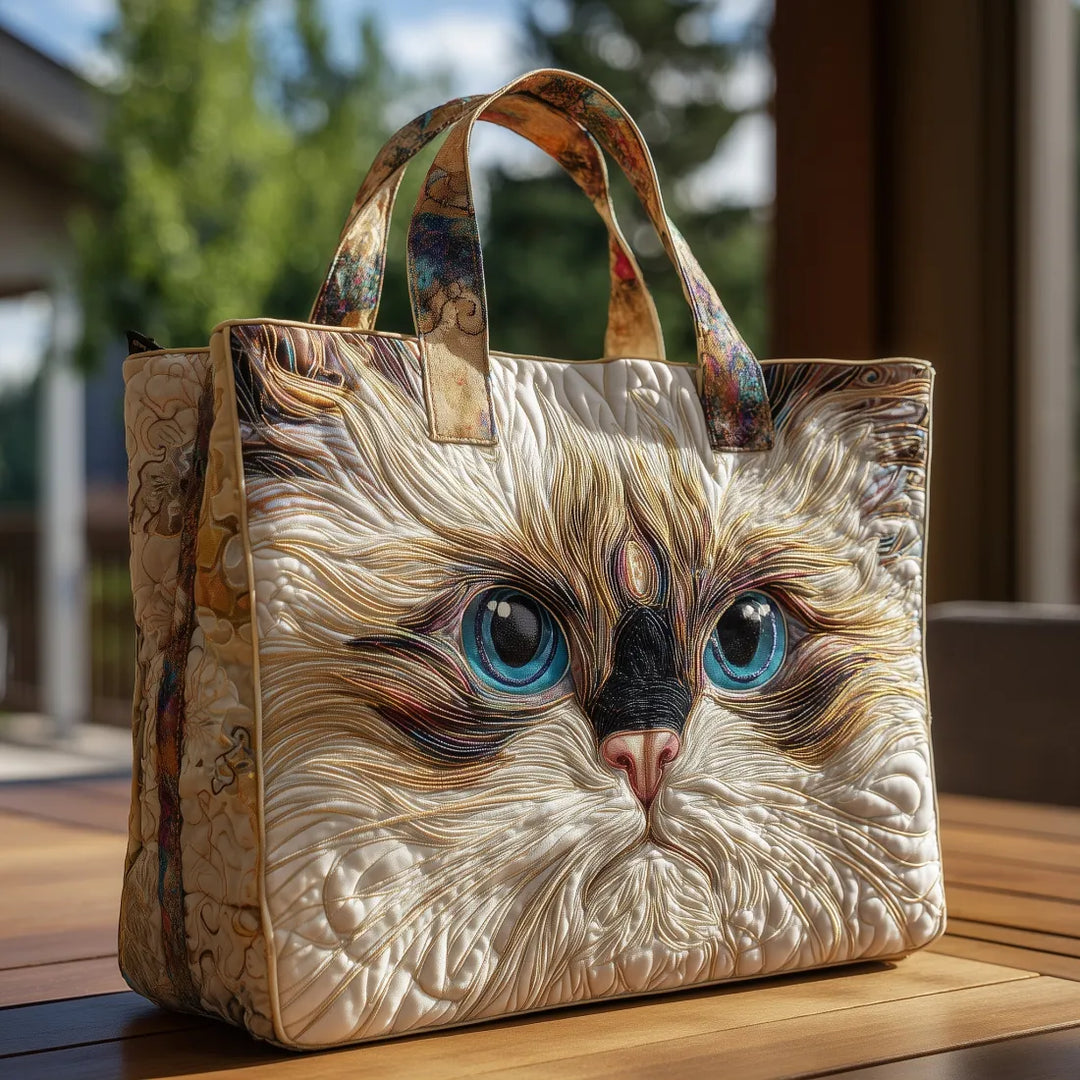 Gesteppte Tote Bag mit Motiv Weisse Katze mit blauen Augen von Maria Zürich