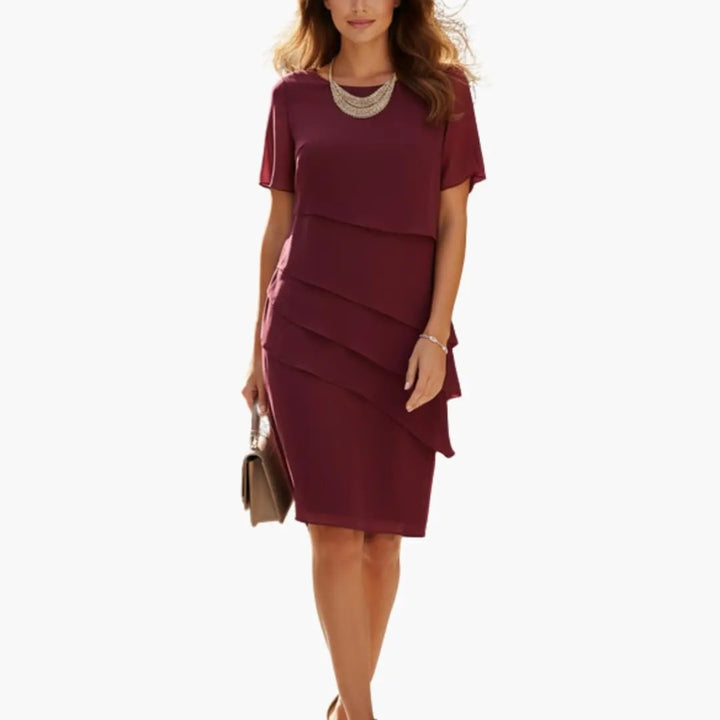 Damenkleid mit definiertem Taillenschnitt und Seitentaschen
