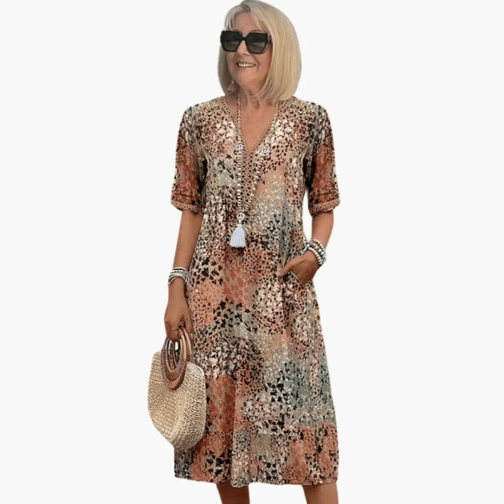 Damen bedrucktes V-Ausschnitt Midi-Kleid mit kurzen Ärmeln und lockerer Passform