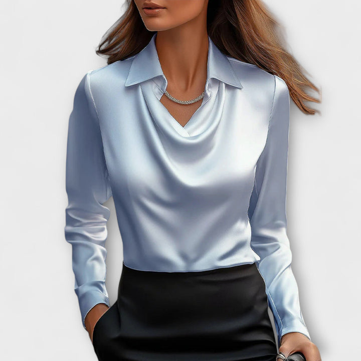 Glänzende Bluse mit Rüschensaum